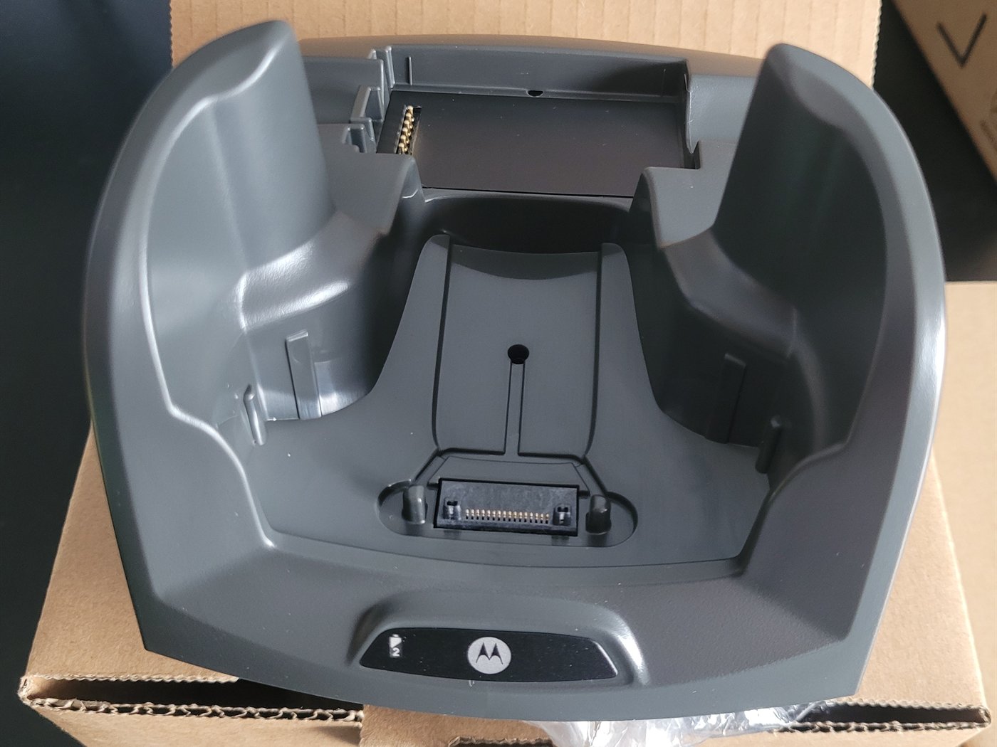 Motorola MC70 / MC75 single-slot charge and USB cradle kit, new in its box, photographed with everything included in the carton